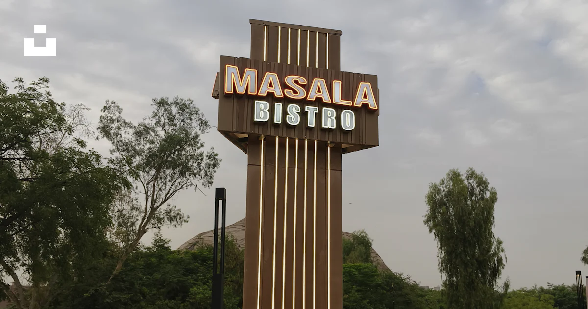 A sign that says masala bistro on it photo – Free Cafe Image on Unsplash