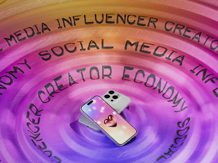 A cell phone sitting on top of a purple circle