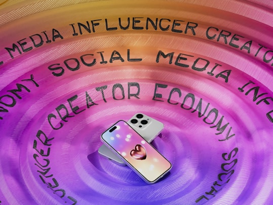 A cell phone sitting on top of a purple circle