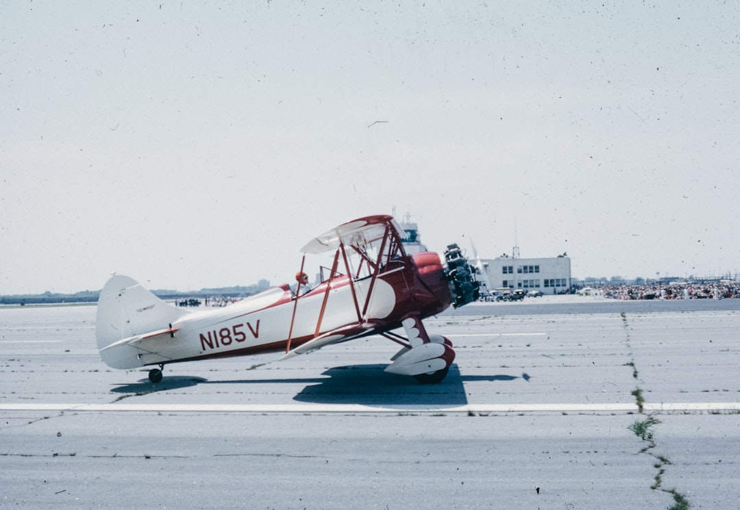 A small airplane sitting on top of an airport tarmac,