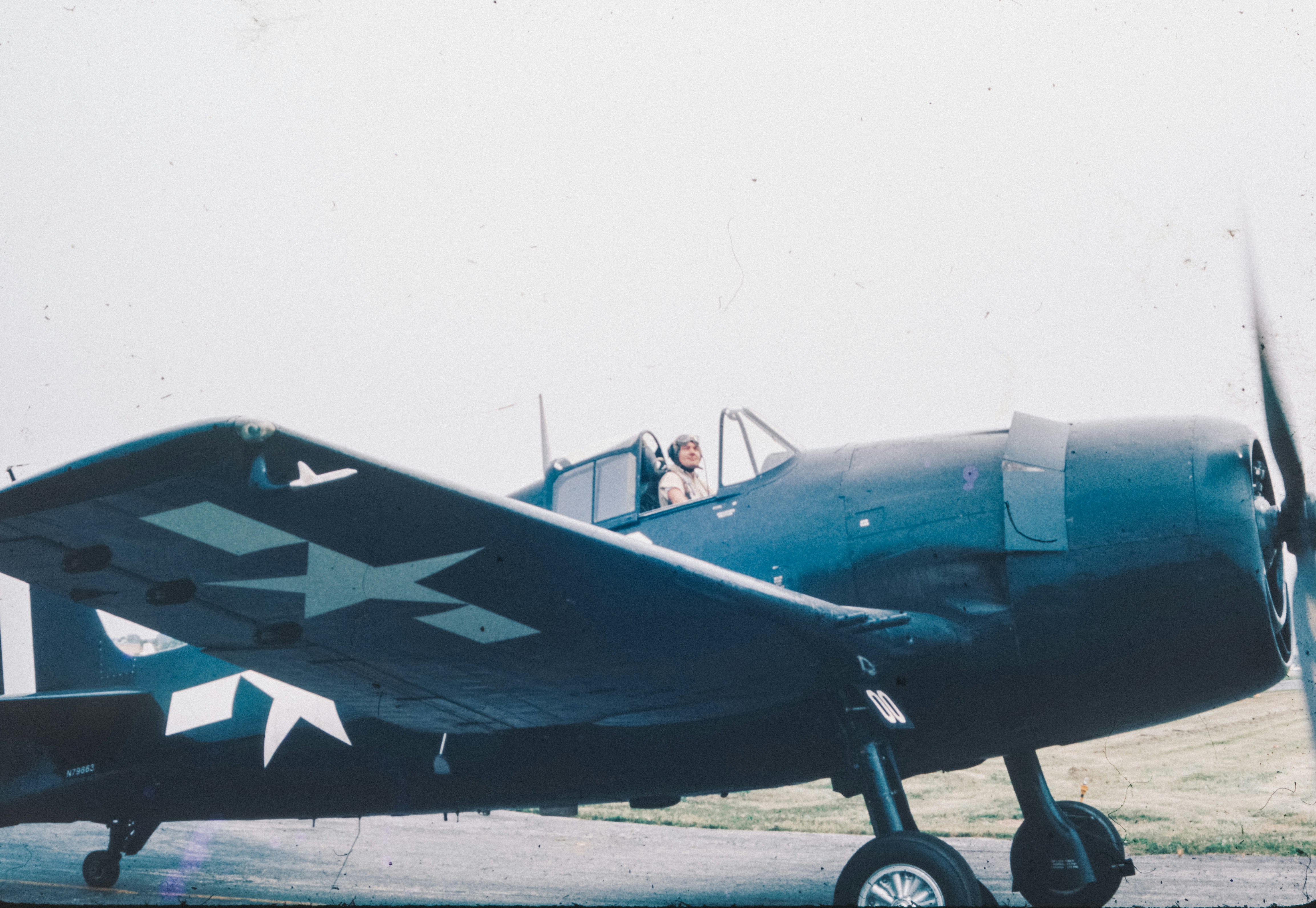 A small airplane sitting on top of an airport tarmac, 