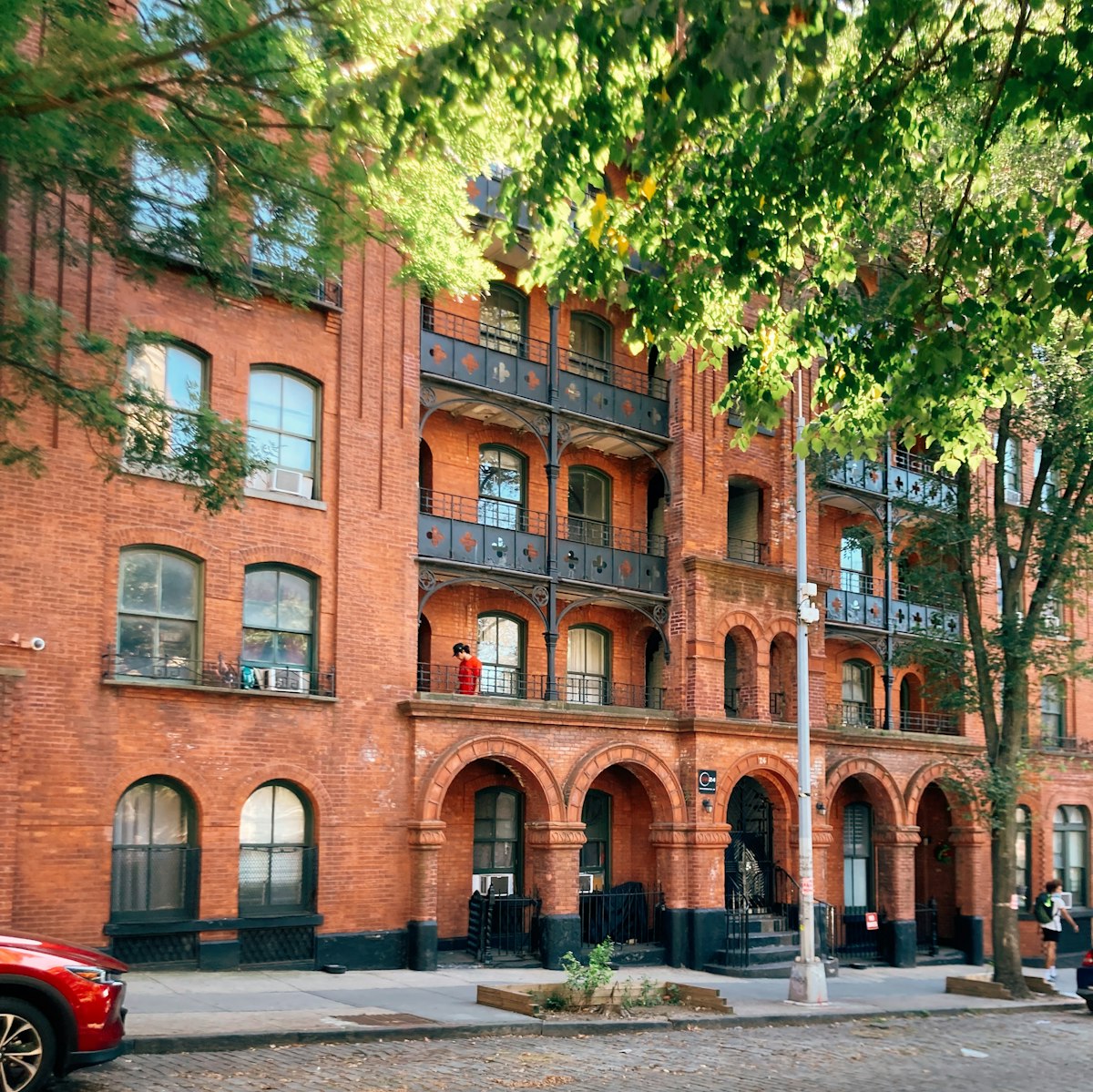 Front facade of the brick multifamily building — Luca Kursawe on Unsplash