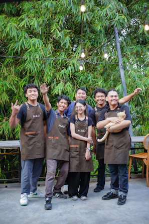 A group of people standing next to each other