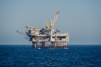 An oil rig in the middle of the ocean