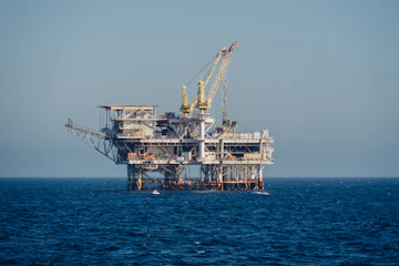 An oil rig in the middle of the ocean