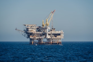 An oil rig in the middle of the ocean