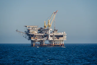 An oil rig in the middle of the ocean