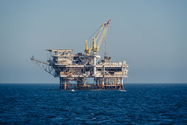 An oil rig in the middle of the ocean