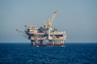 An oil rig in the middle of the ocean