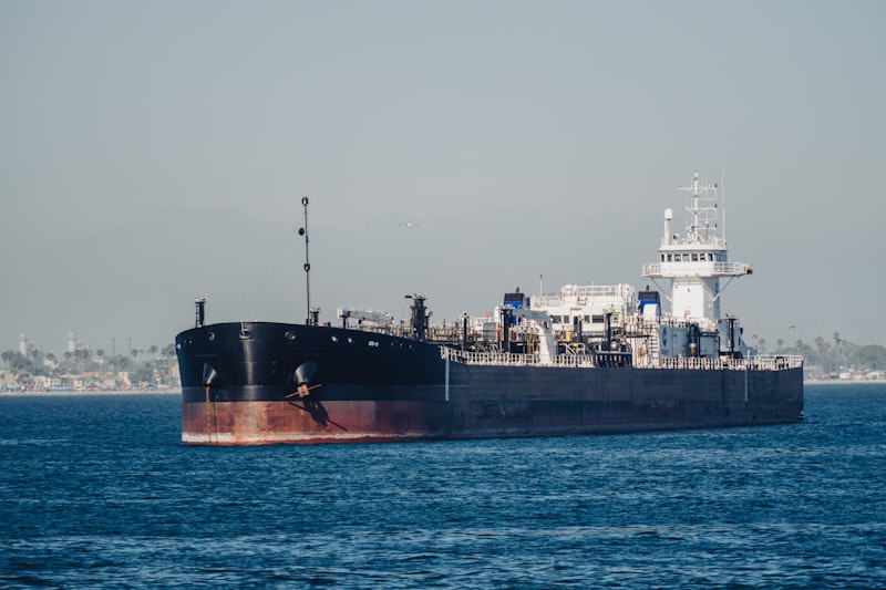 A large cargo ship in the middle of the ocean