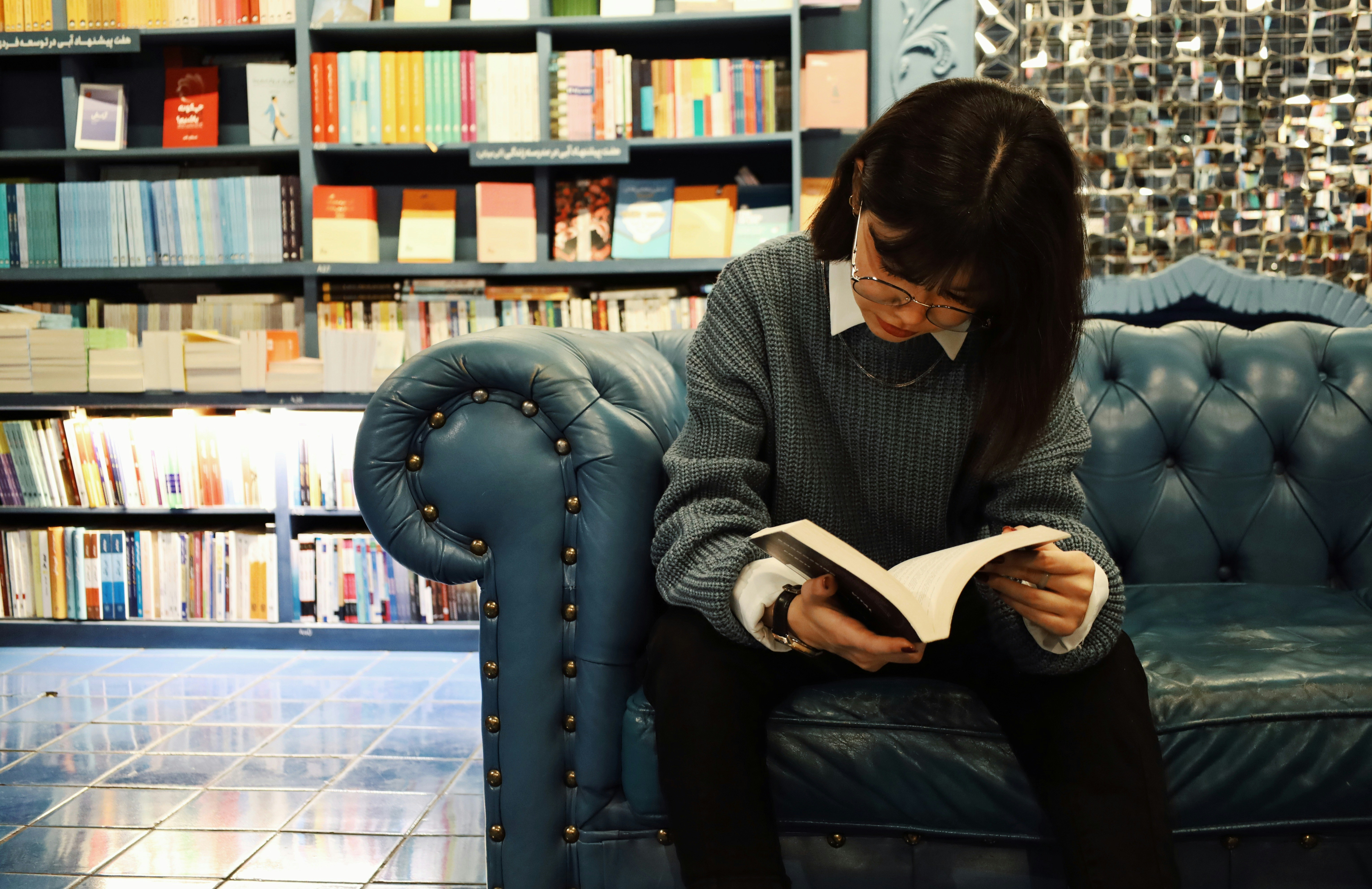 Woman reading on couch