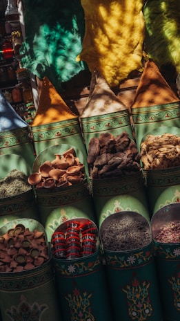 A variety of spices are on display at a market