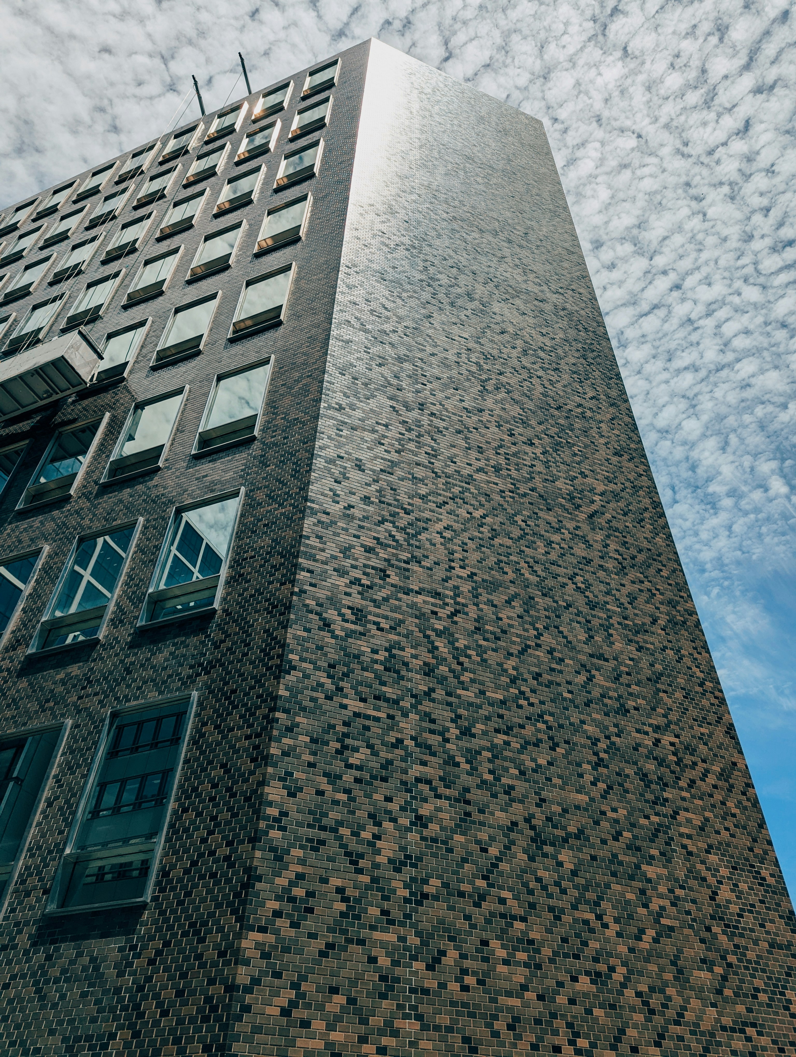 A tall building with a sky background