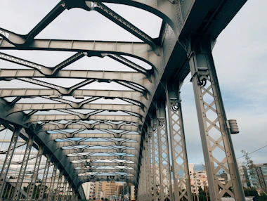 A view of a bridge from the ground