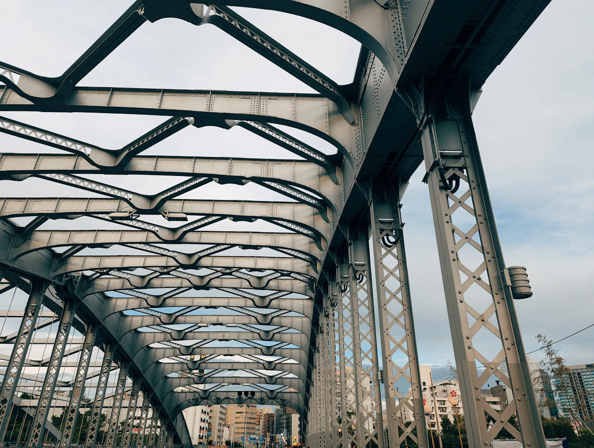 View of a steel bridge structure from the ground