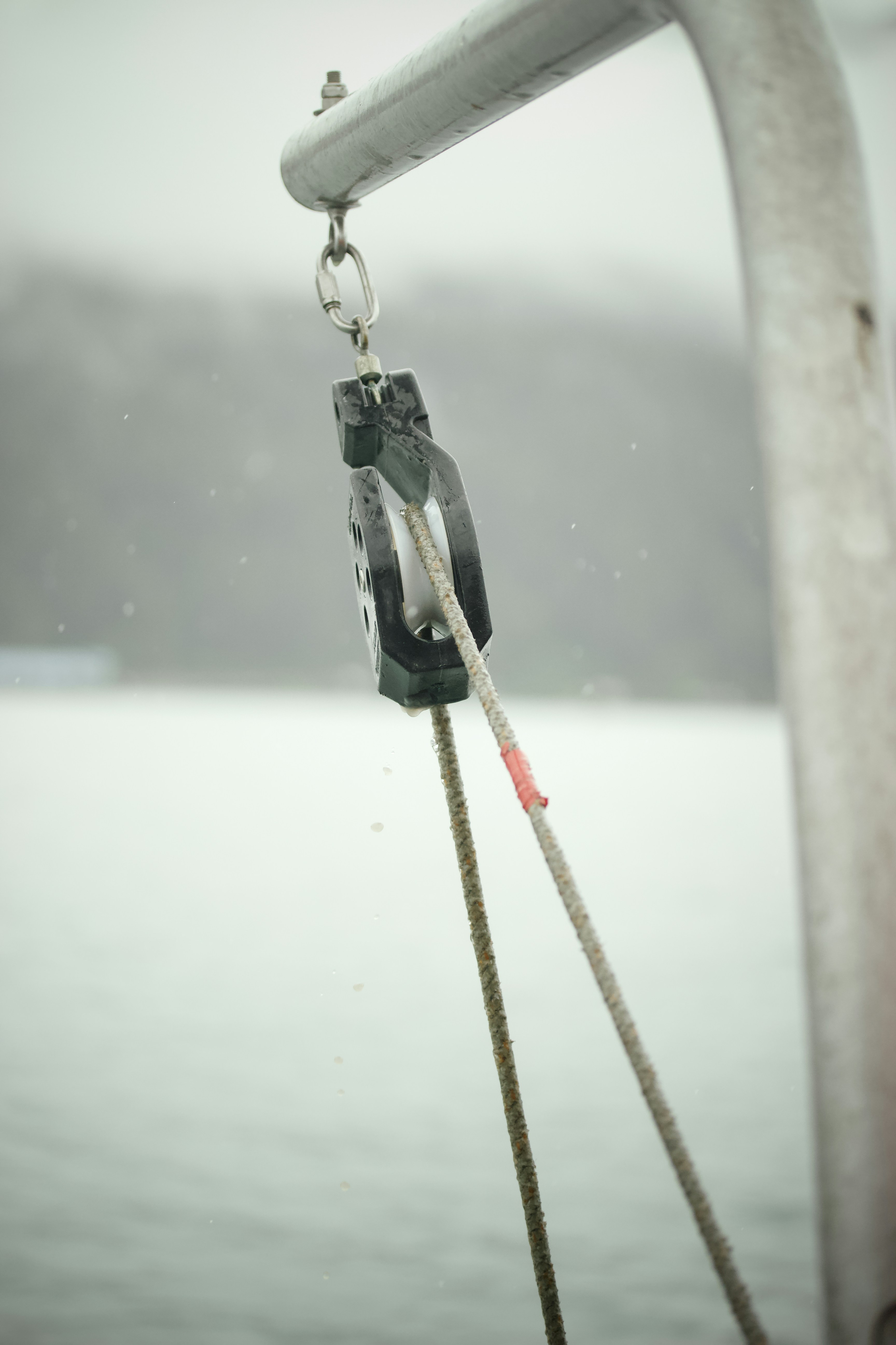 A close up of a rope on a boat in the water