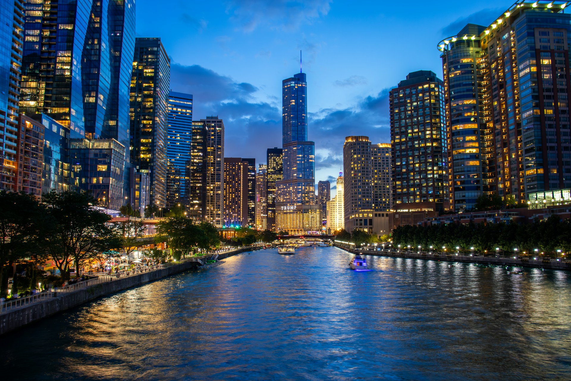 A river running through a city at night