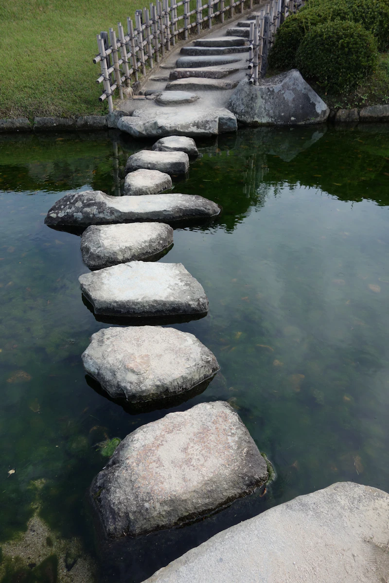 Smooth stepping stones across calm water