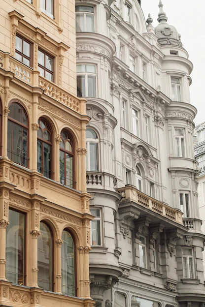 A row of buildings with a clock on the top of one of them