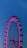 A pink ferris wheel lit up at night