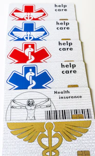 A pair of medical id cards with a cadus symbol