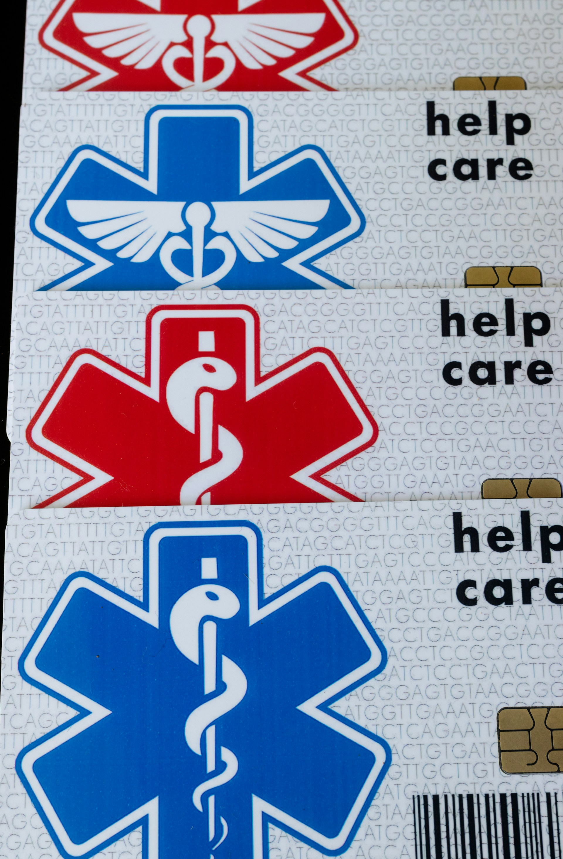 Three medical stickers with the words help, help, and care on them