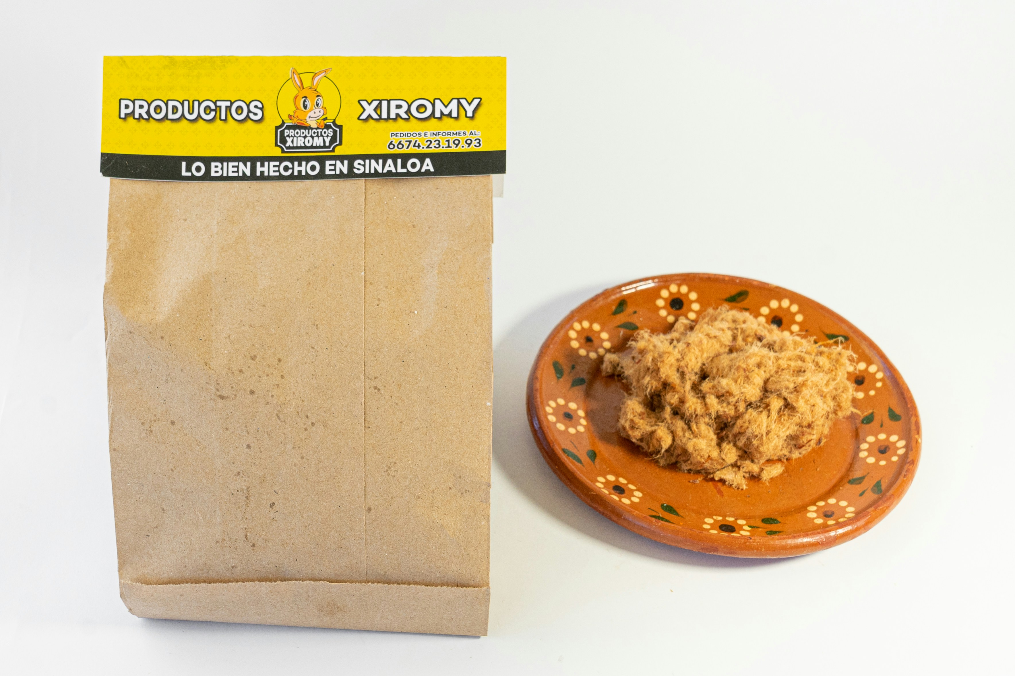 Fotomural A bag of cookies next to a plate of cookies