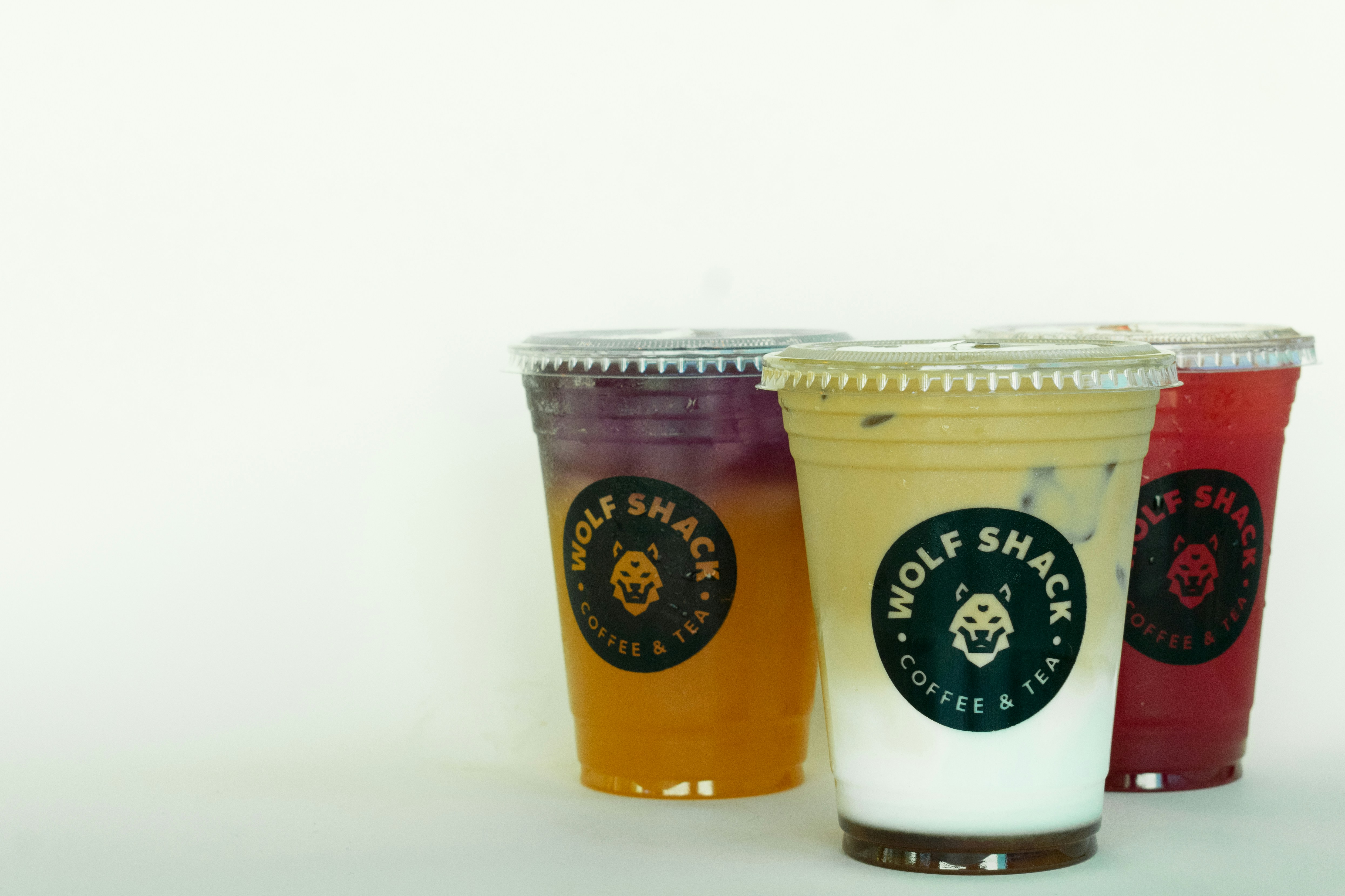 Three different types of drinks sitting next to each other