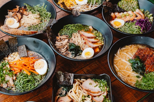 A table topped with lots of different types of food