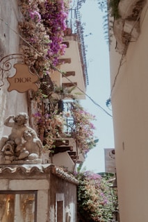 A statue of a dog on top of a building