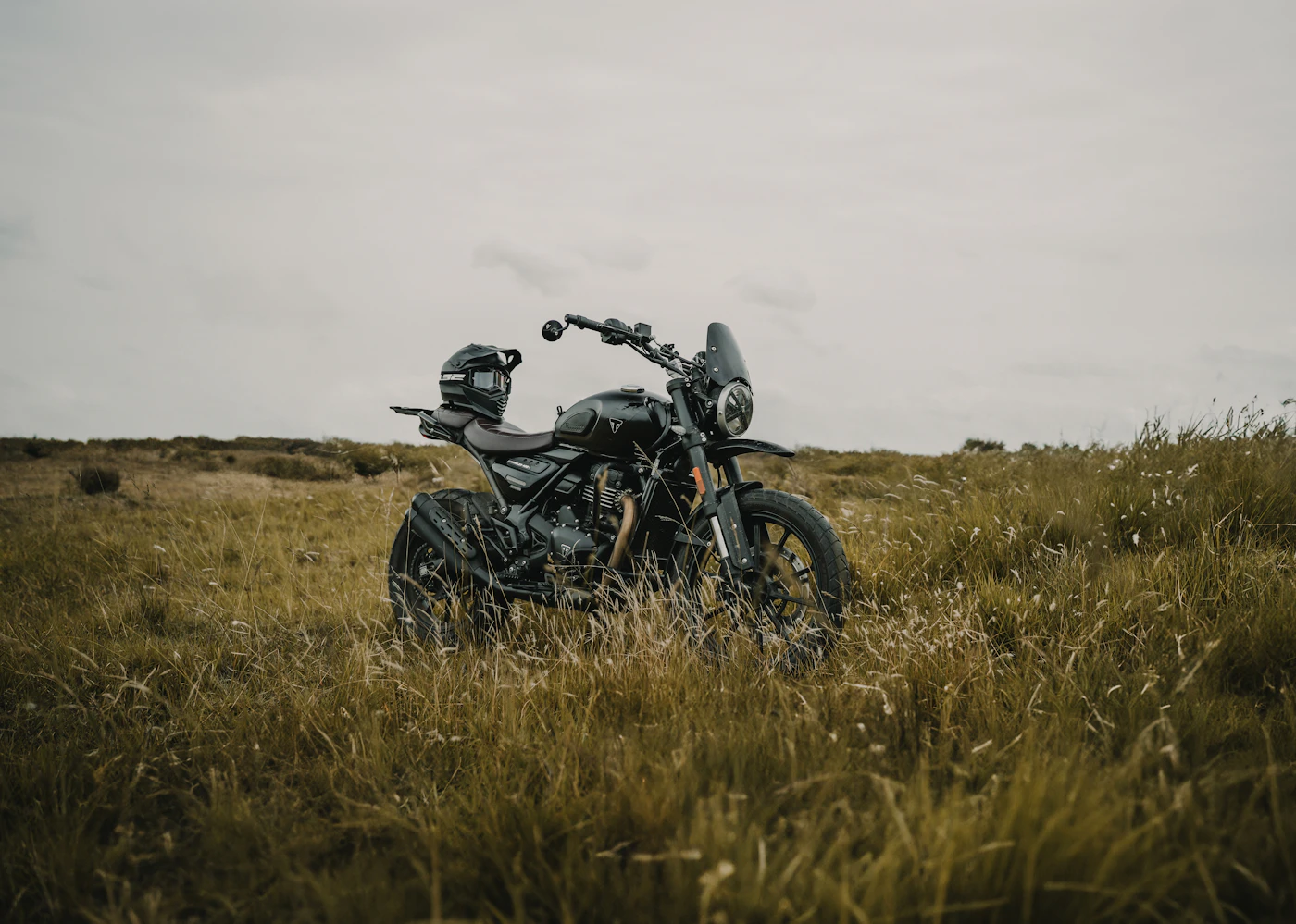 Triumph Scrambler parked, side profile