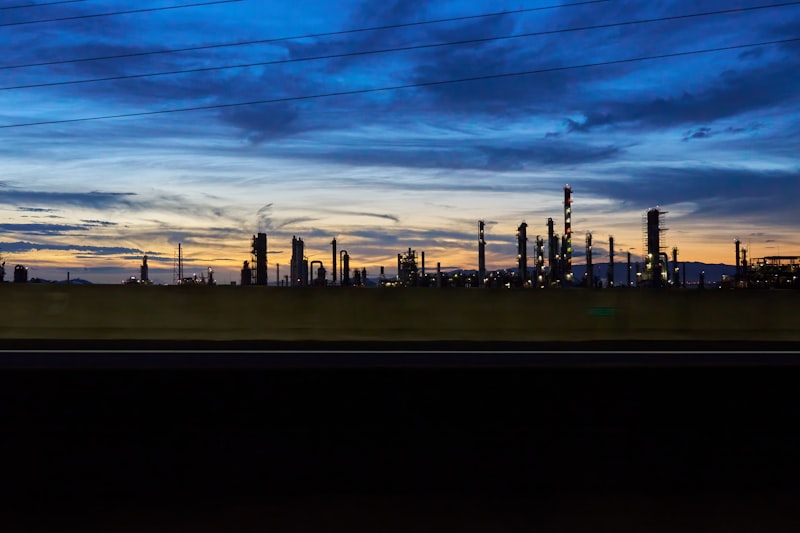 Oil refinery and energy infrastructure at dusk