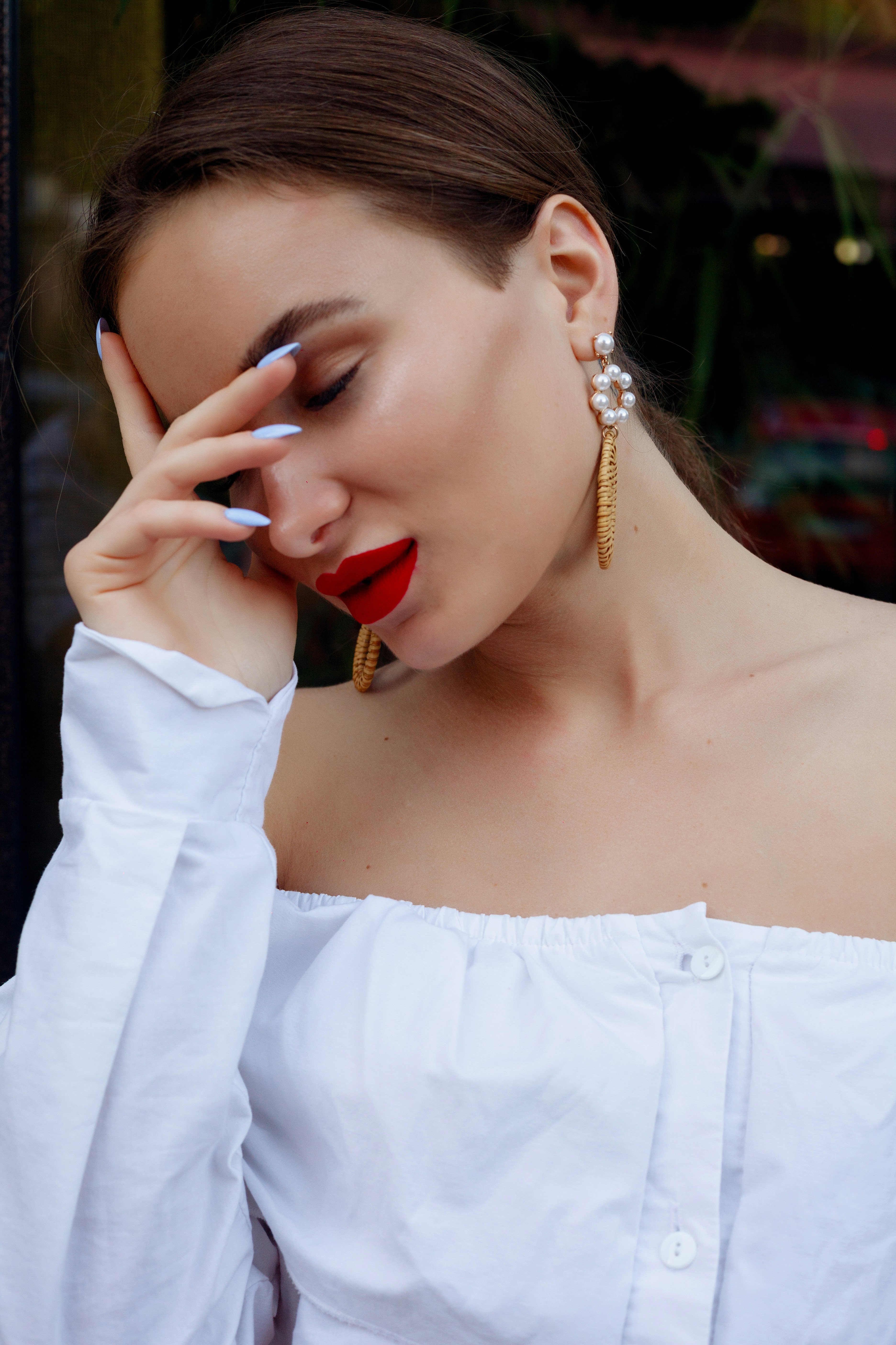 woman wearing yellow long-sleeved dress under white clouds and blue sky during daytime