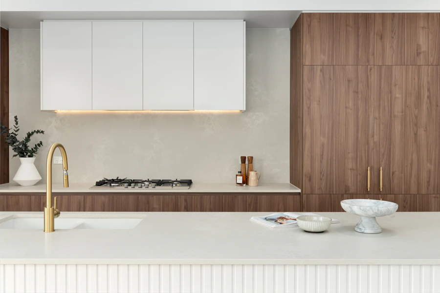 Minimal kitchen in white and walnut