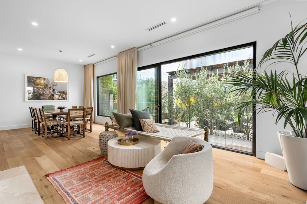 Bright living space opening onto a garden