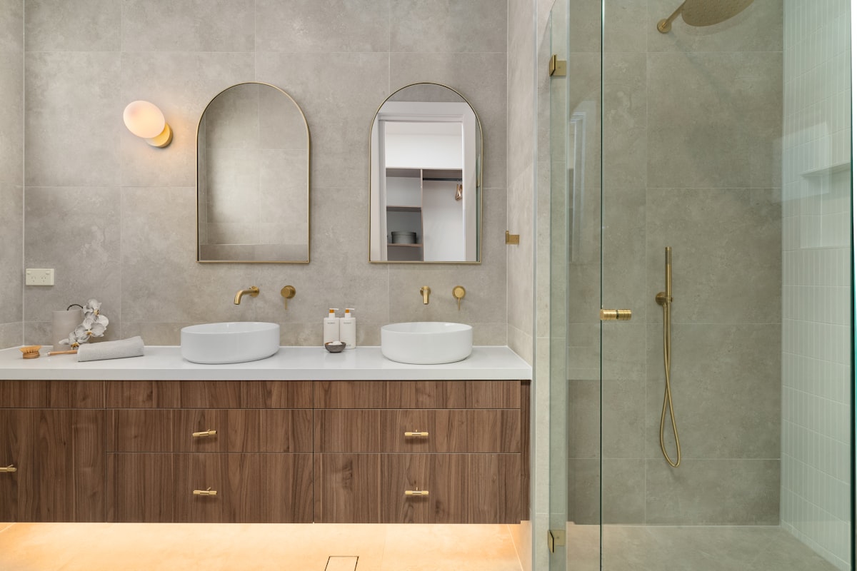 Elegant bathroom renovation with modern fixtures and tile work