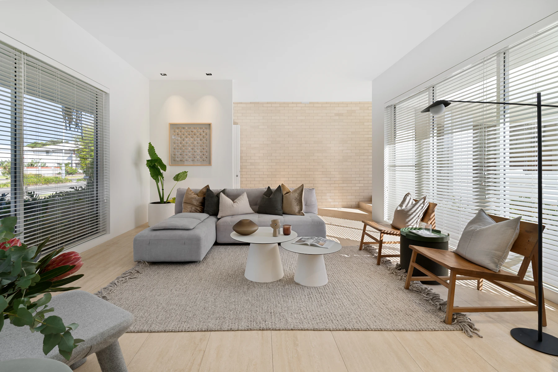 Contemporary living room with wood flooring and window blinds