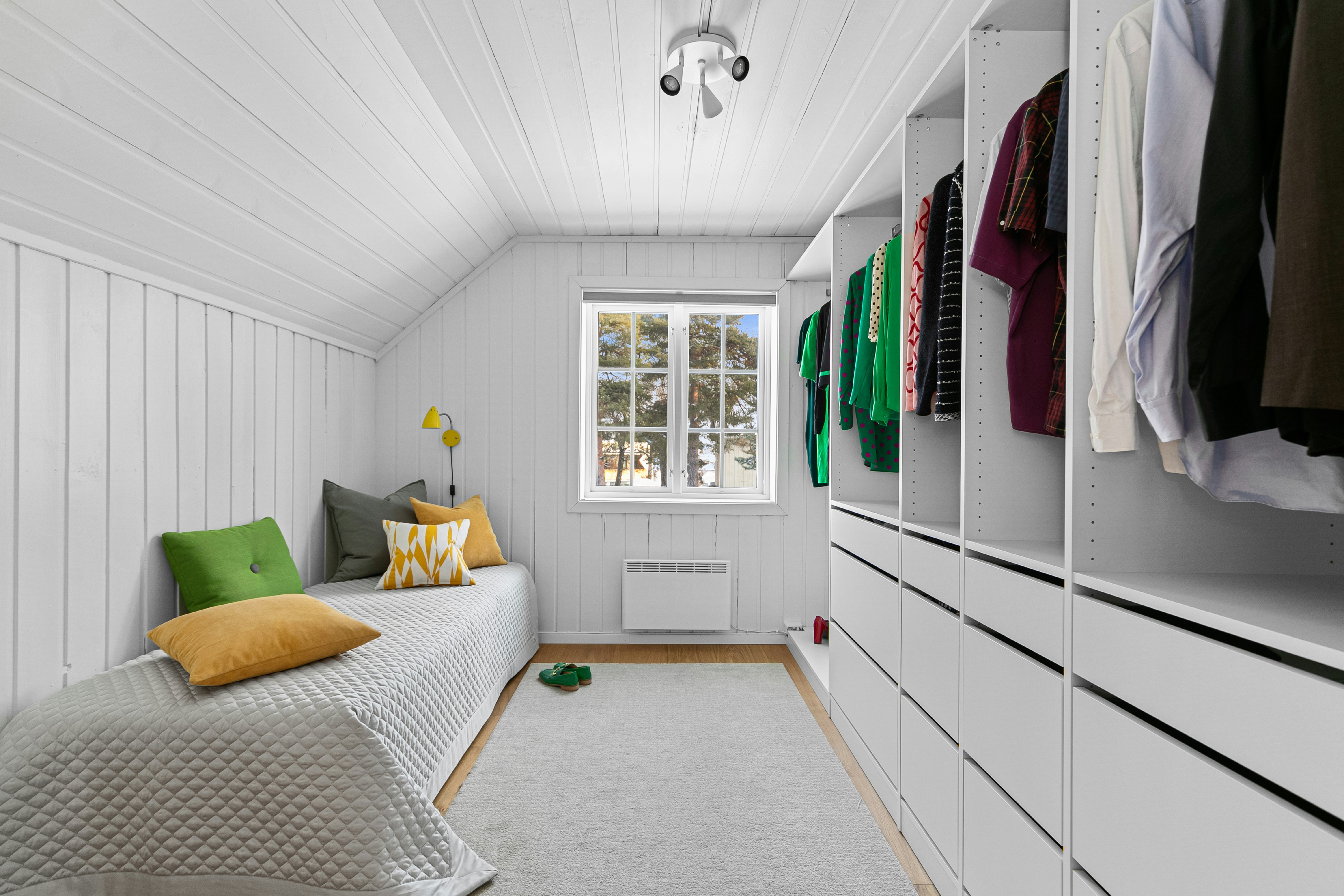 A spacious primary bedroom with a large, organized walk-in closet - 1200 sq ft apartment plan