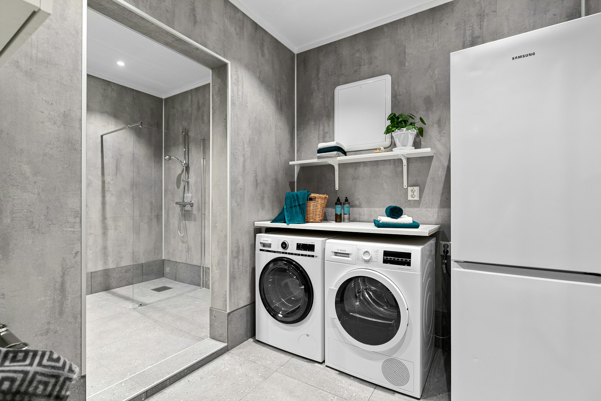 A washer and dryer in a small room
