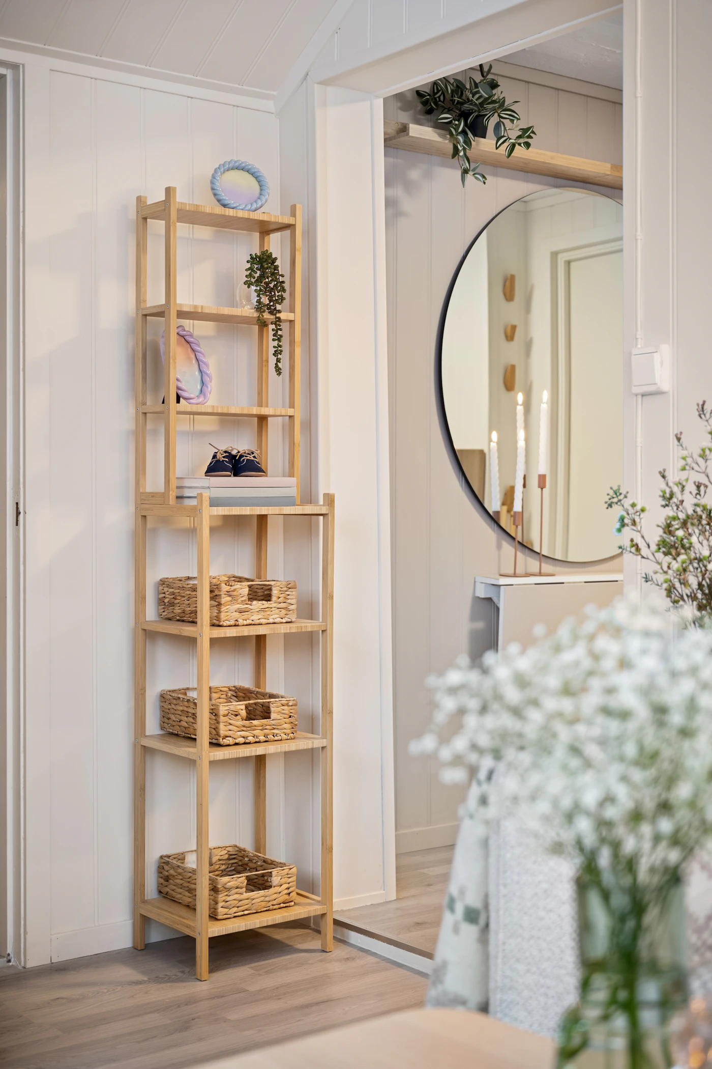 Wooden cabinet with ceramic vases