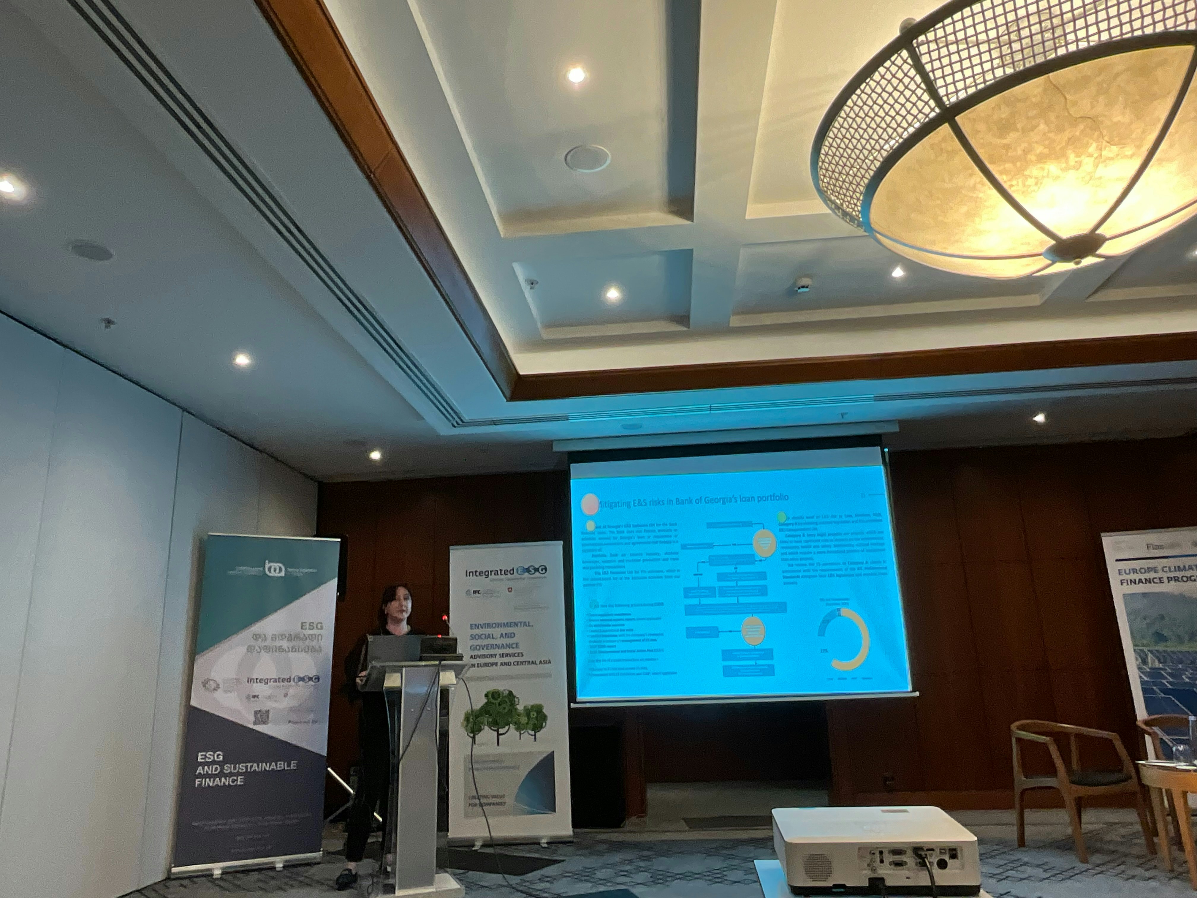 Tourism sustainability expert presenting eco-friendly travel solutions