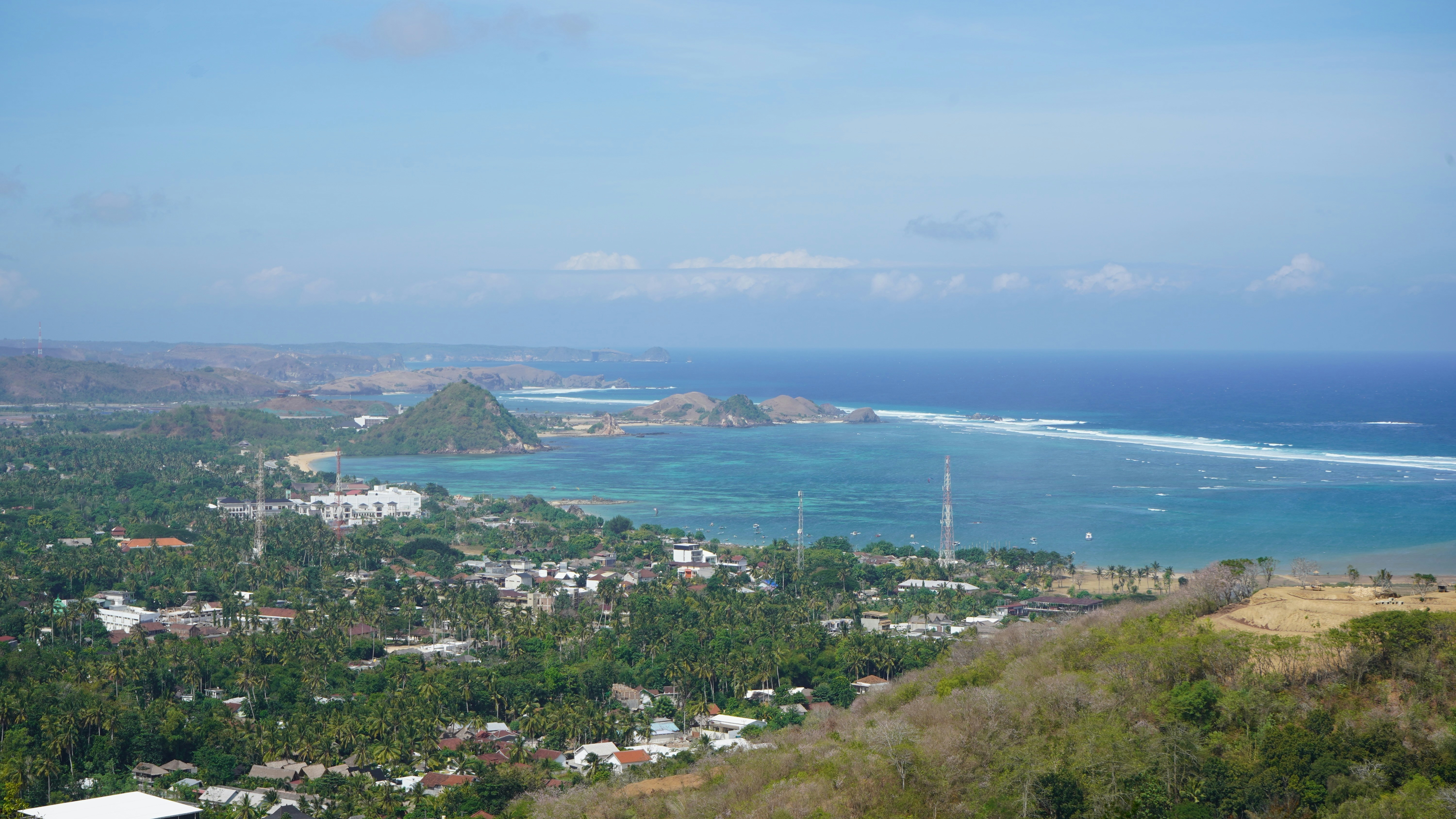 A view of the ocean from a hill