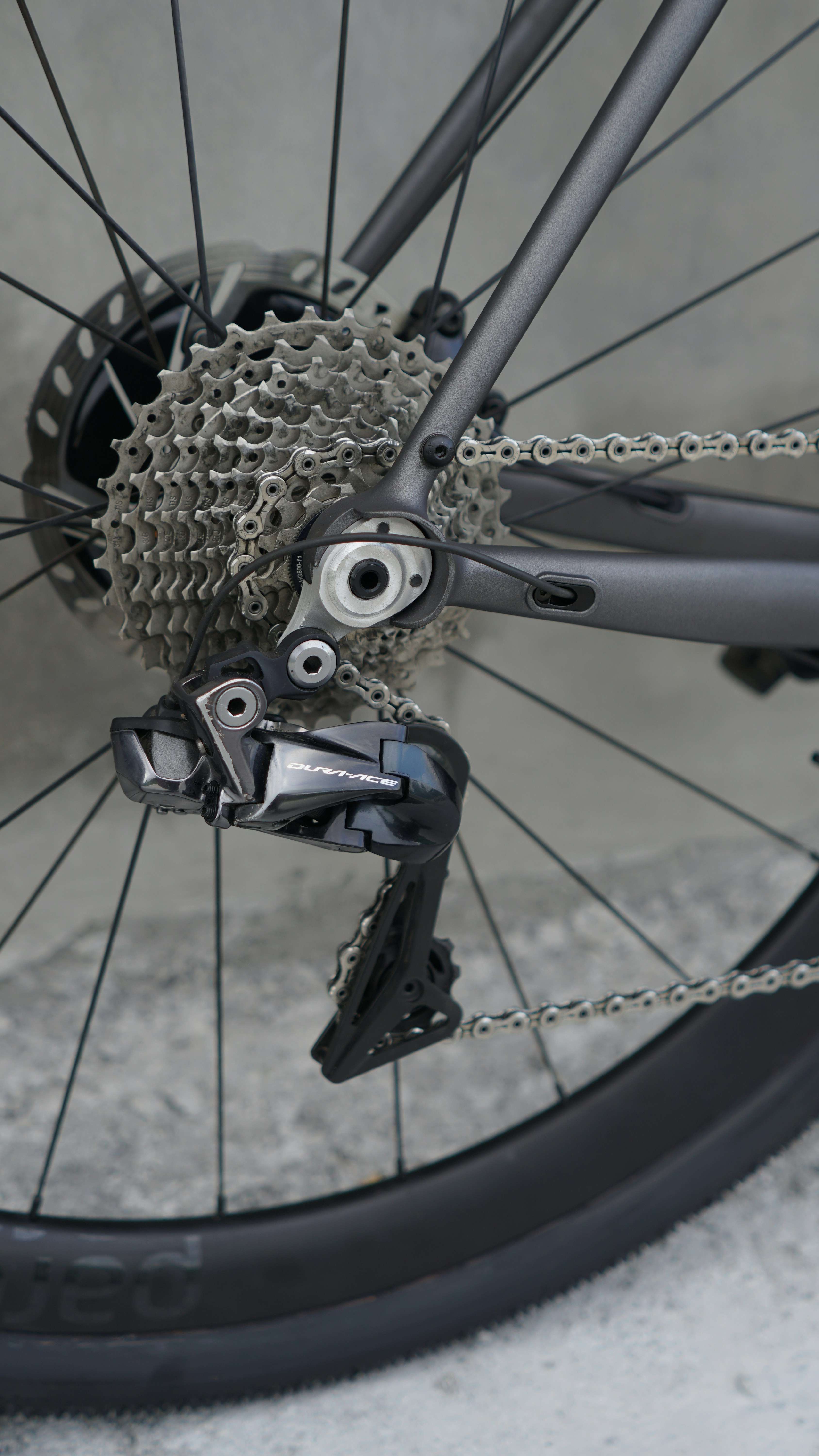 A close up of a bike with a chain on it