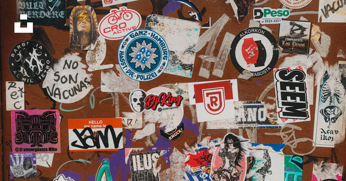A door covered in lots of stickers and magnets photo – Free Madrid ...