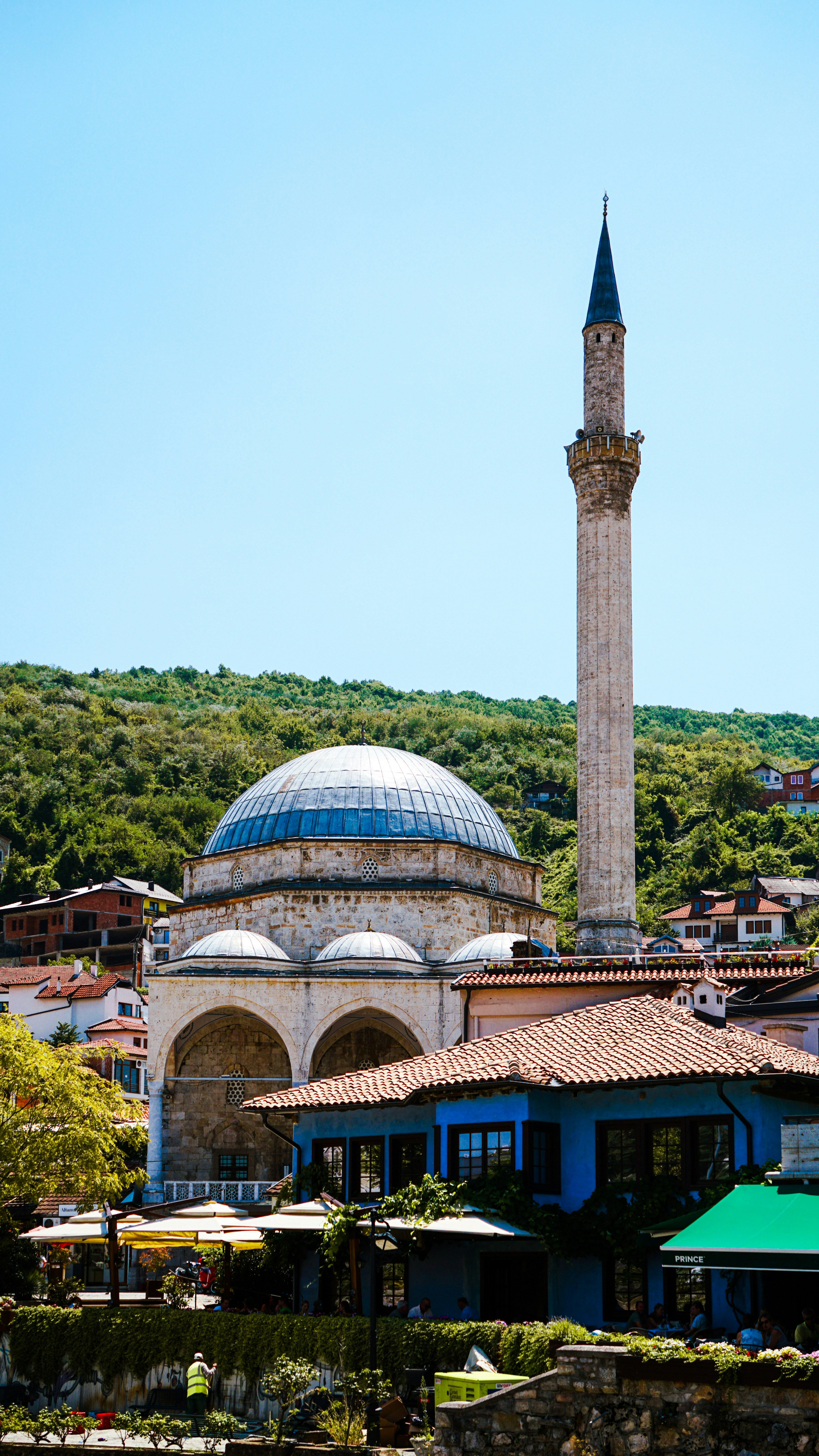 A large building with a blue dome on top of it