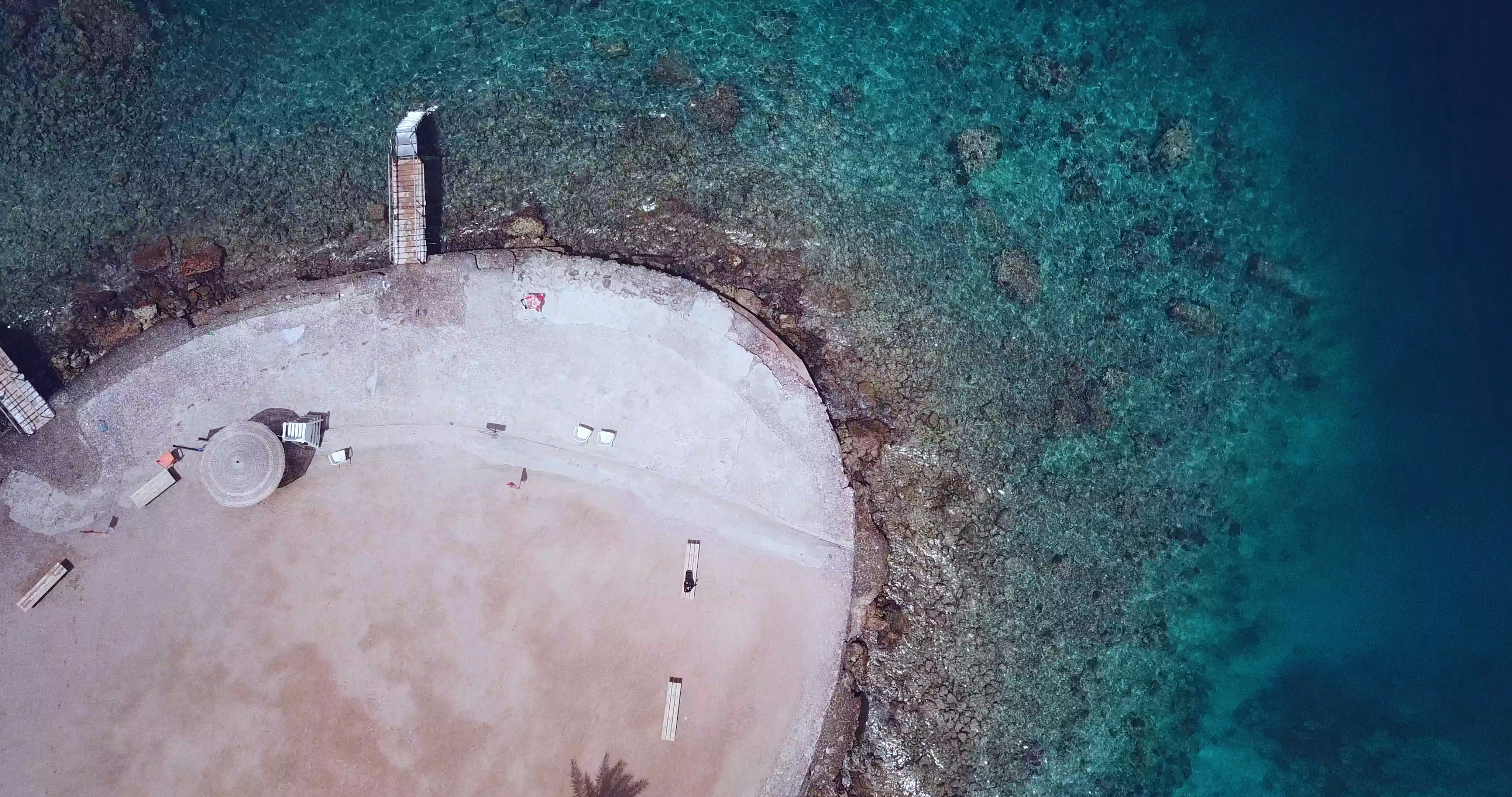 An aerial view of a boat in the water