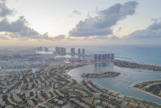An aerial view of a city and a body of water