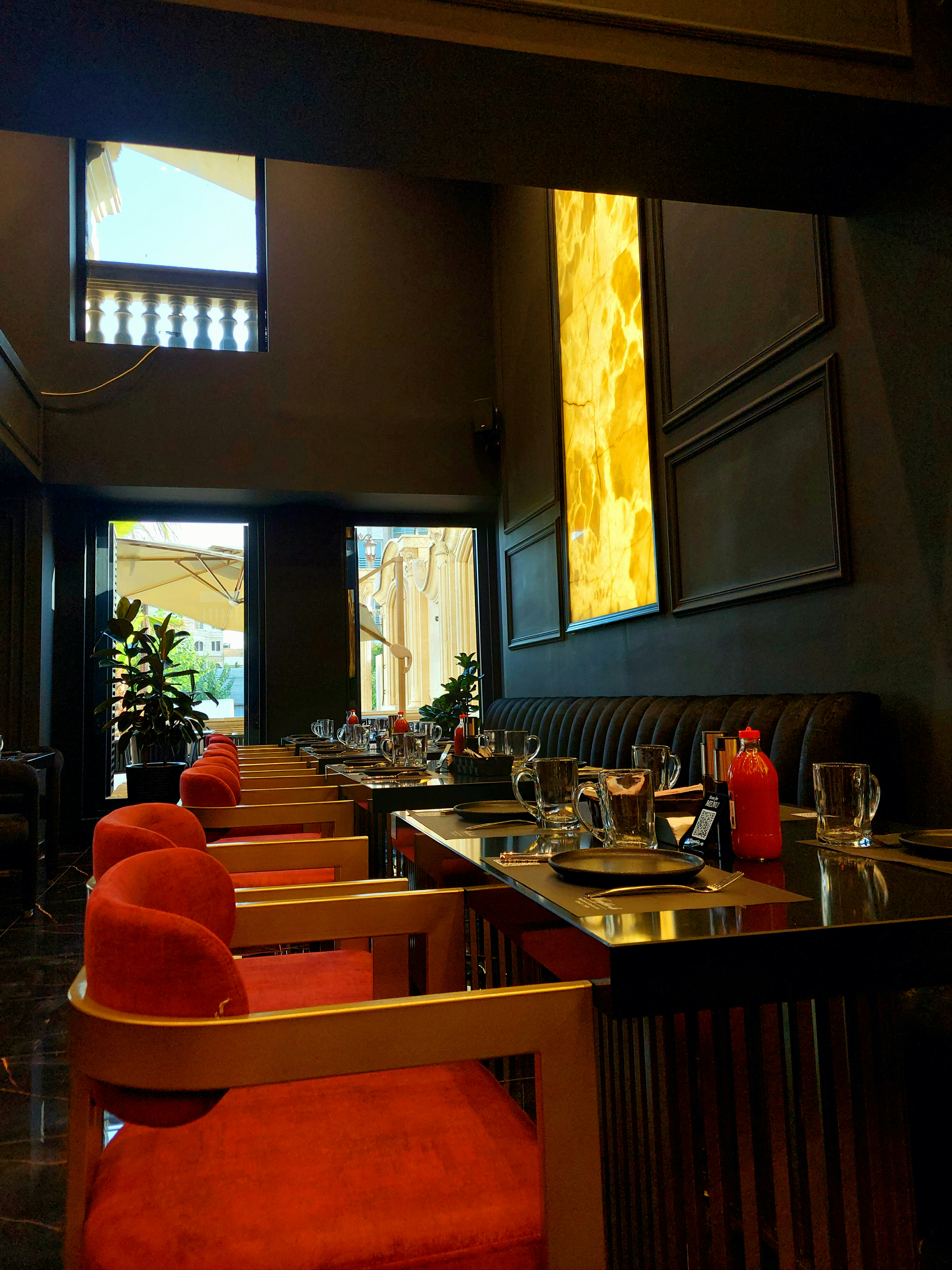 Elegant restaurant interior at Rosie's Bar and Grill with warm lighting, decorated tables and welcoming atmosphere