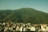 A view of a city with mountains in the background