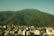 A view of a city with mountains in the background